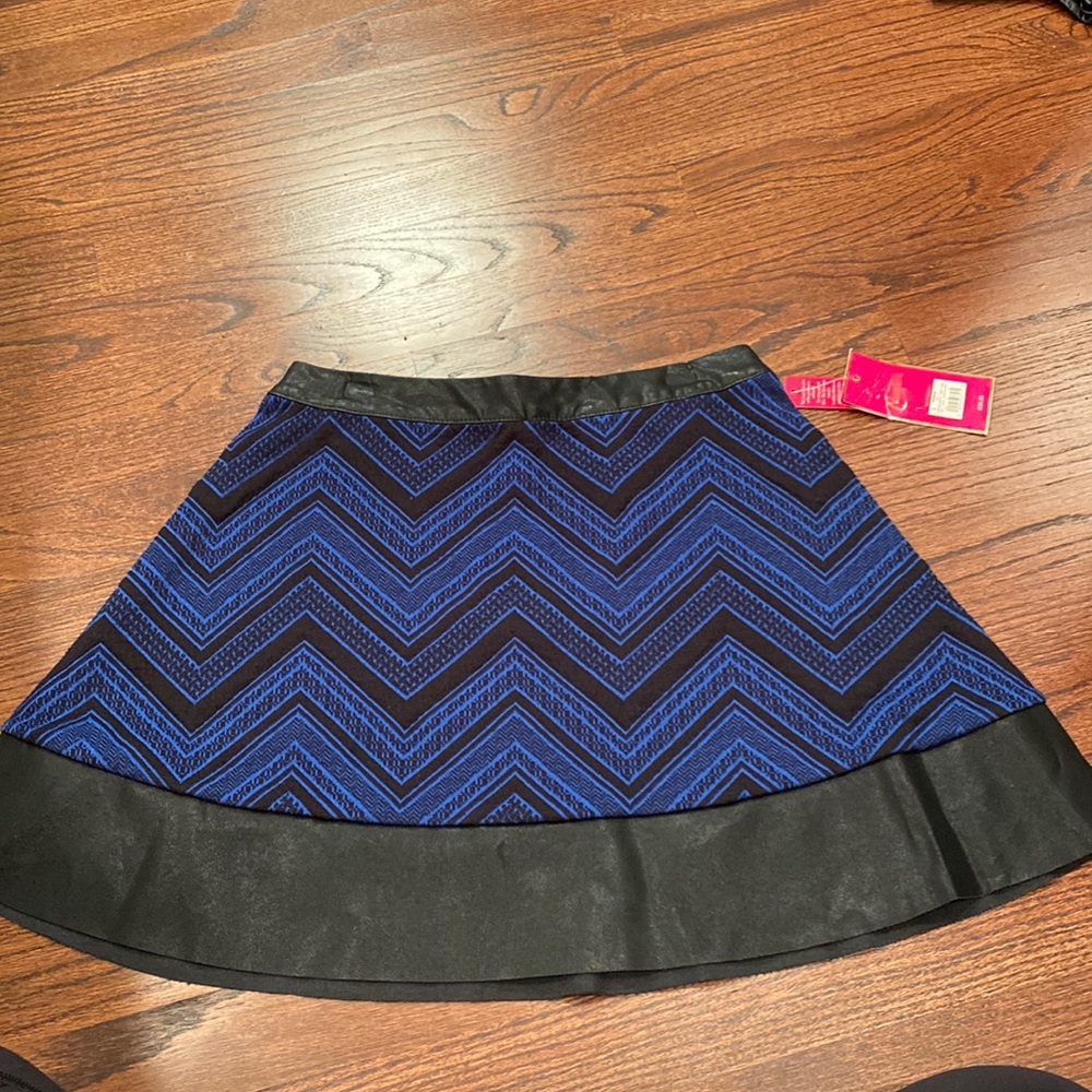 Dark blue and black patterned skirt.
